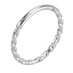 Twisted hinge segmented click ring
