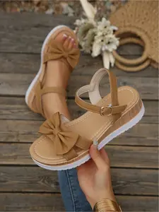 Women's new plus-size hollow-out buckle bow-decorated round-toe wedge sandals for outdoor wear, stylish, simple, comfortable, lightweight, suitable for daily commuting, with a thick sole, Adjustable Strap Sandals