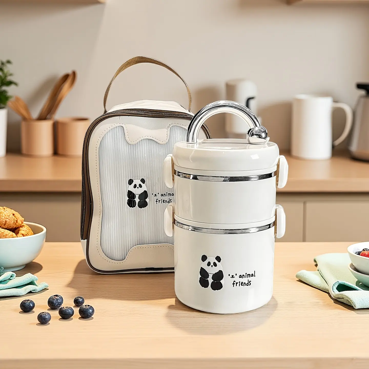 A 2-tier cute panda-patterned insulated lunch box with 304 stainless steel, leak-proof silicone latches, an insulated bag, 2 compartments for soup, dishes and staples, plus a portable handle—ideal for work, school and travel