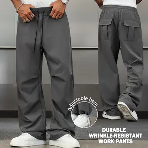 American high-street functional men’s cargo pants — casual loose drawstring straight-leg pants with an elastic waistband and rear pockets; adjustable hem cuffs; versatile long pants for everyday wear and going out.