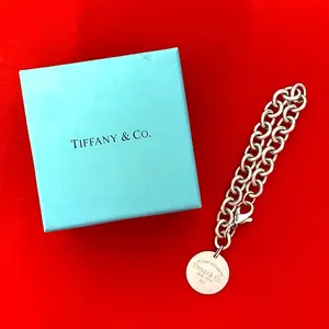 Pre-owned Tiffany & Co. Sterling Silver 925 (Ag925) Small Leather Goods Tiffany Return to Round Tag Silver 925 Bracelet