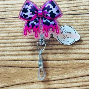 Cow Print Pink Drip Bow Badge Reel