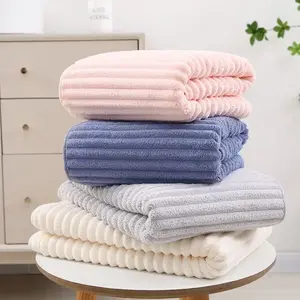 4-pack of oversized microfiber bath towels, extra large and thick, highly absorbent, soft and gentle on the skin—perfect for showering, the beach, pool, bathroom, salon, and parties.