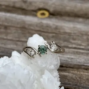 Diamonds and Green Sapphire Bypass Ring