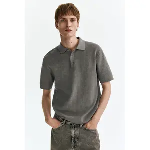 H&M Regular Fit Textured-knit polo shirt