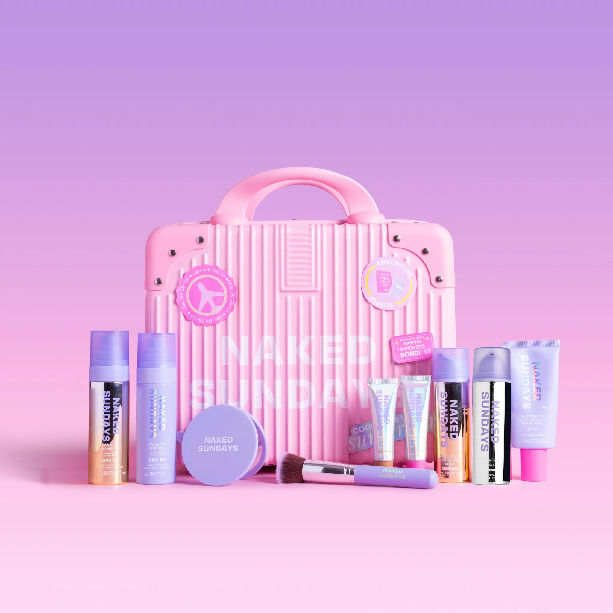 First Class Jetsetter Beauty Bundle Kit - Mini Exclusive Pink Suitcase plus Naked Sundays bestselling SPF and Skincare products  (SAVE 60%)