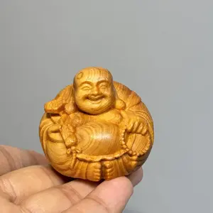 A Smiling Little Monk Statue from Zen, Perfect for Indoor Home Decor, an Ideal Choice for Year-Round Decoration