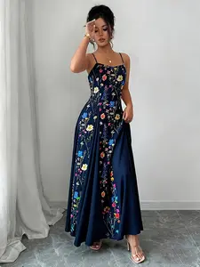 A fashionable women's navy blue floral print camisole dress with delicate floral print. The camisole design is off the shoulder and suitable for commuting to work, shopping, and outdoor wear