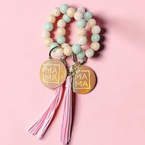 Random Mama Keychain with Beaded Design and Tassel Detail