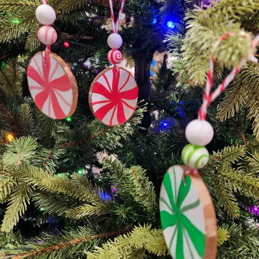 Hand Painted Wooden Peppermint Christmas Ornaments with Unique Acrylic Design Perfect for Holiday Decor and Gift Giving