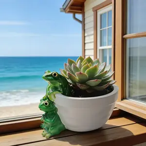 A frog companion planter available in gray and white, Charming frog design, featuring large and small frog designs with a rounded pot body, it's both a planting container and a desk ornament that adds fun and vitality to your desk corner!