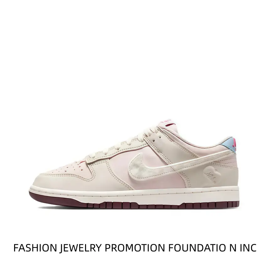 This soft pale pink and cream low-top sneaker with subtle heart embroidery and burgundy outsole, perfect for casual daily fits and feminine street style.