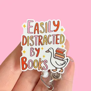Glitter My Badge Silly goose easily distracted by books badge reel for nurse and hospital workers. Badge clip Badge pull - Retractable swivel clip with a 360 rotation. Great gift for coworkers.