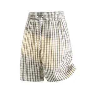 New summer plaid shorts with elastic waistband and drawstring; loose, breathable mid-length shorts with a cotton-linen feel; relaxed vintage wide-leg shorts; unisex beach shorts suitable for commuting and versatile styling.