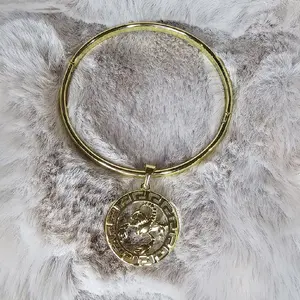 BANGLER CON SIGNOS SODIACALES DE  14K 4MM