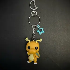 Dragonite Keychain with Clip - Character Design, Yellow Body, Blue Accents, Includes Clip Attachment