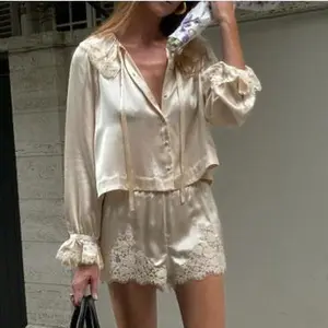 Women Long Sleeve Button Down Top with Elastic Waist Pants 2 Piece Soft Sleepwear Set Perfect for Comfortable Lounging and Relaxing at Home