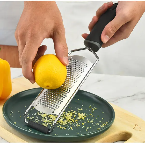 Stainless Steel Lemon Grater with Handle, compact parmesan grater - Durable, Rustproof Kitchen Utensil with Cover for All Seasons Cheese, Lemon Grating, kitchen accessories