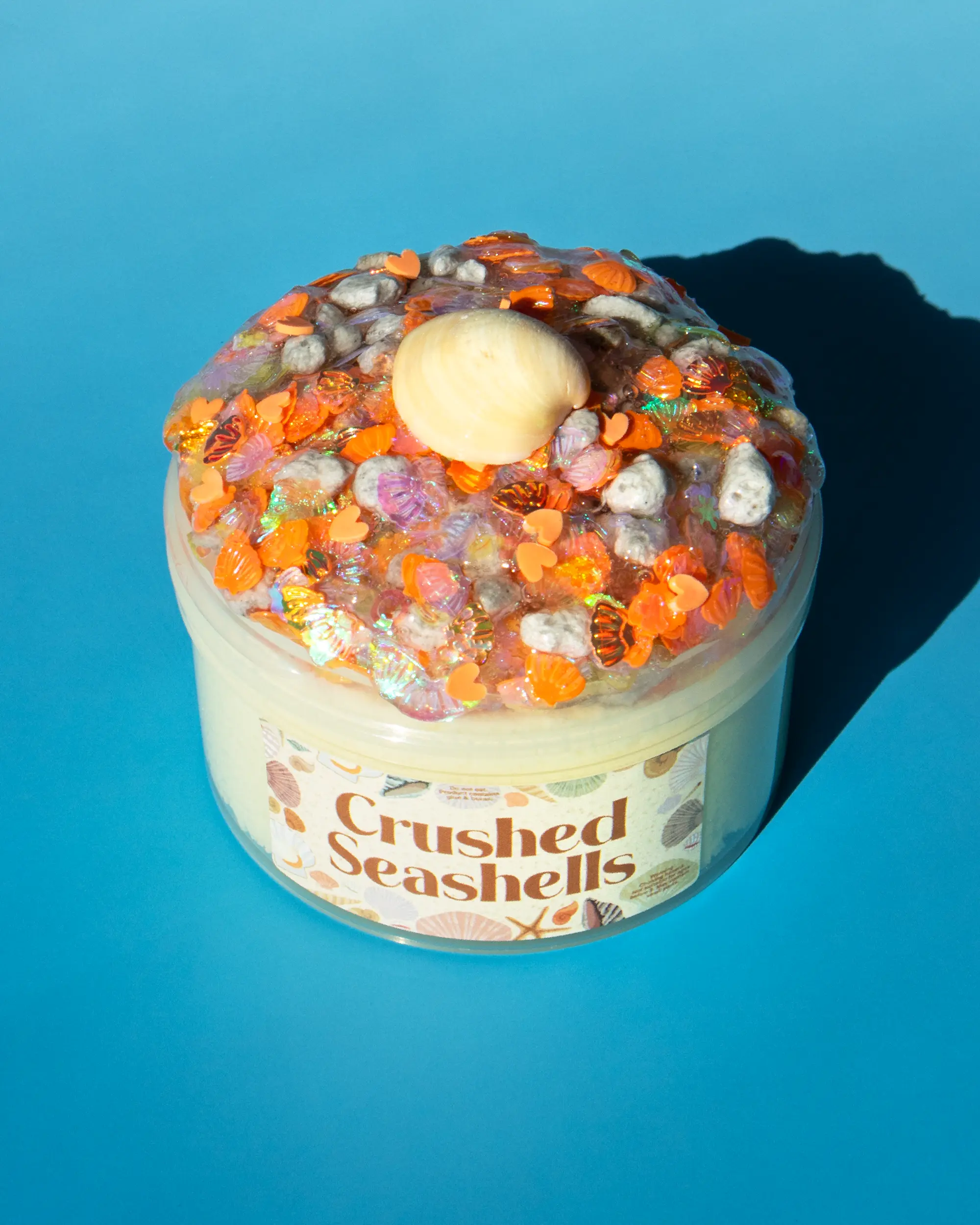 Crushed Seashells - OG Slimes 7 oz Snow Fuzz slime + 3 oz Sequin Bomb Topper