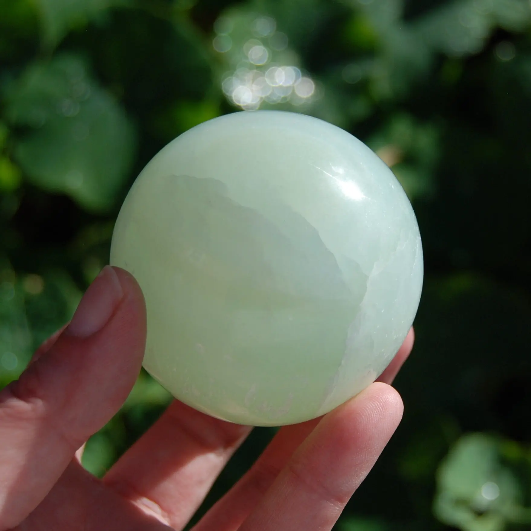 2.6in 397g Pistachio Green Calcite Crystal Sphere