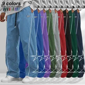 American street-style wide-leg athletic pants with star print, side-striped drawstring waist, high-street trendy design, versatile cargo pants with a loose drape that doesn’t cling to the legs, available in multiple colors, suitable for everyday workouts