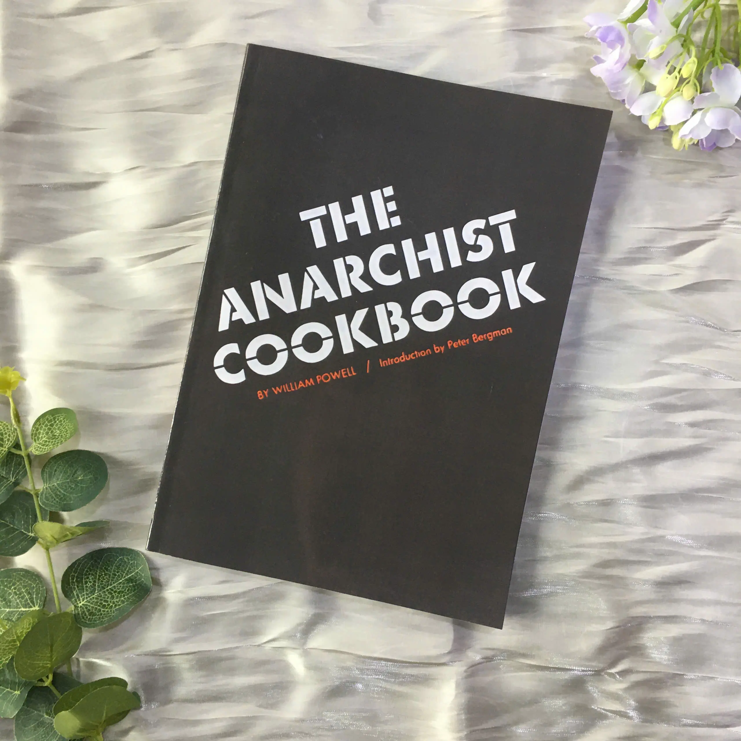 The Anarchist Cookbook by William Powell, Counterculture Reference Book with Introduction, Paperback Edition