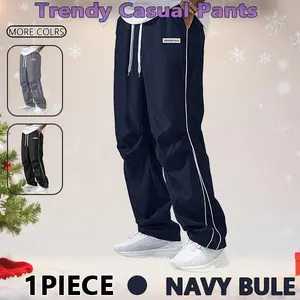 Men‘s Loose Sports Pants Men Trousers Grey Side Stripeswith Gold Accent Stripe Comfortable DesignAthleisure Style Bottoms Athletic Bottoms Gymwear streetwear fall outfits outfits men gym athletic clothes