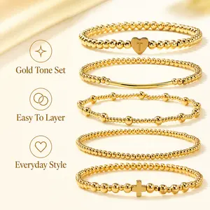 Gold Tone Beaded Bracelet Set for Women, Stackable Layered Bracelets with Heart T Charm, Cross Charm and Bar Detail, Everyday Fashion Jewelry Gift