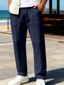 Men's stretch Polyester athletic pants with side stripes, elastic waist, loose pleated cuffs, wide leg. Fitness jogging pants, trendy and versatile casual pants that are essential for any casual outing! Outdoor sports pants!