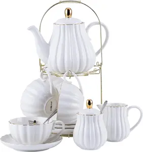Elevate your tea time with the Jusalpha 17-Piece Porcelain Tea Set! Includes 8 oz white cups, saucers, spoons, a teapot, and creamer. Perfect for cozy gatherings and everyday elegance. #TeaTime #PorcelainSet #HomeDecor
