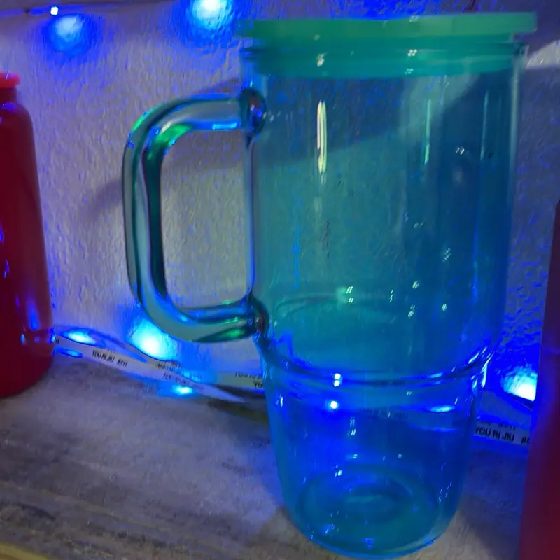 20oz glass cup 1 live claim pick design (teal left)
