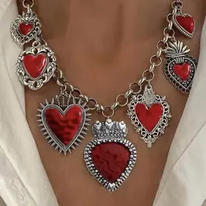 1pc Chunky Vintage Gothic Heart Multi-Pendant Necklace ️  Make a bold statement with this stunning vintage-inspired gothic heart necklace! Featuring multiple heart pendants, including detailed heart lockets, in antique silver and gold tones with striki