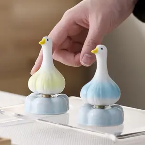 Cute Garlic Duck Spinning Ornament, Funny Ceramic Duck Figurine Desk Decor, Rotating Stress Relief Duck Toy for Office & Home, Kawaii "Forget It" Duck Statue Gift #FFM