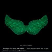 Green swallow-shaped wings
