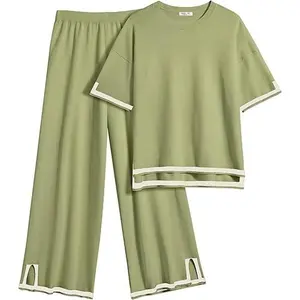 Women’s casual two-piece travel outfit: short-sleeved sweater top and wide-leg pants — GARMENTARY