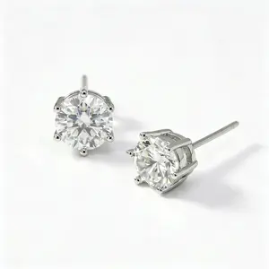 A pair of eye-catching stud earrings featuring two 5-carat diamonds (10×10 each) in an ice flower cut (square with ，also known as Radiant Cut) setting.The center stones are set toshowcase their brilliance
