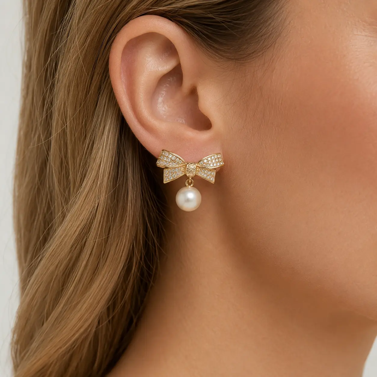 Tewiky Women's Gold Pearl Bowknot Decorated Stud Drops Earrings, Bling Effect Metal Coating Sparkly Ribbon Dainty Jewelry, Everyday Sparkle for Wedding Party Gift, Bow Accent Earrings, Dangling Pearl Stud Earrings