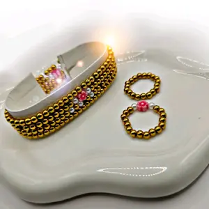 set of beaded bracelets and matching rings featuring gold-toned beads, white pearls 4mm Gold Plated 18k stainless steel