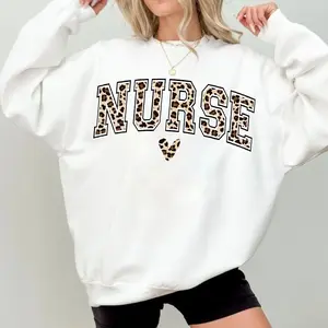 [Made in USA] Nurse Sweatshirt, Leopard Nurse Graphic Crewneck Pullover, Trendy RN Nurse Aesthetic Sweatshirt, Cute Medical Letter Print Crewneck, Nurses Week Gift, Gift For Nurse Women RN