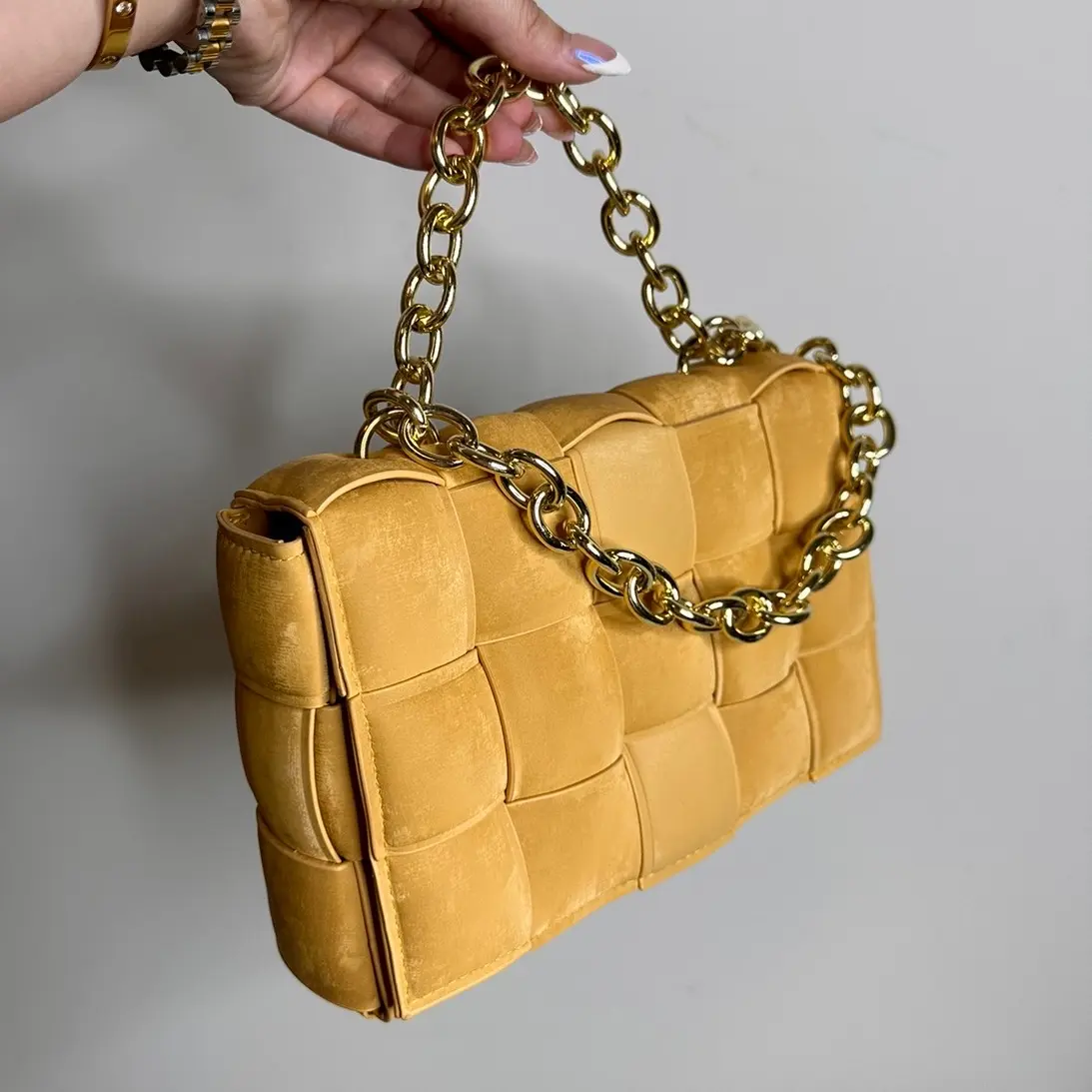 Quilted suede crossbody handbag