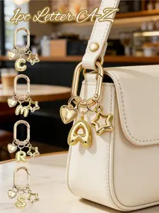 Gold Bubble Letter A-Z Keychains For Women, Cute Letter Accessories With Heart And Hollow Star Pendant, Shiny Metal Letter Keychains, Personalized Bag Decoration, Handbag Backpack Wallet Charm, Car Key Chain Decor. Suitable For Daily Use.