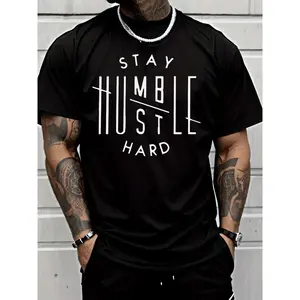 Unisex Graphic T-Shirt “Stay Humble Hustle Hard” Print, Casual Short Sleeve Crew Neck Tee, Soft Breathable Fabric, Relaxed Fit Streetwear Top for Men and Women, Ideal for Daily Wear, Gym, Travel and Trendy Outfits