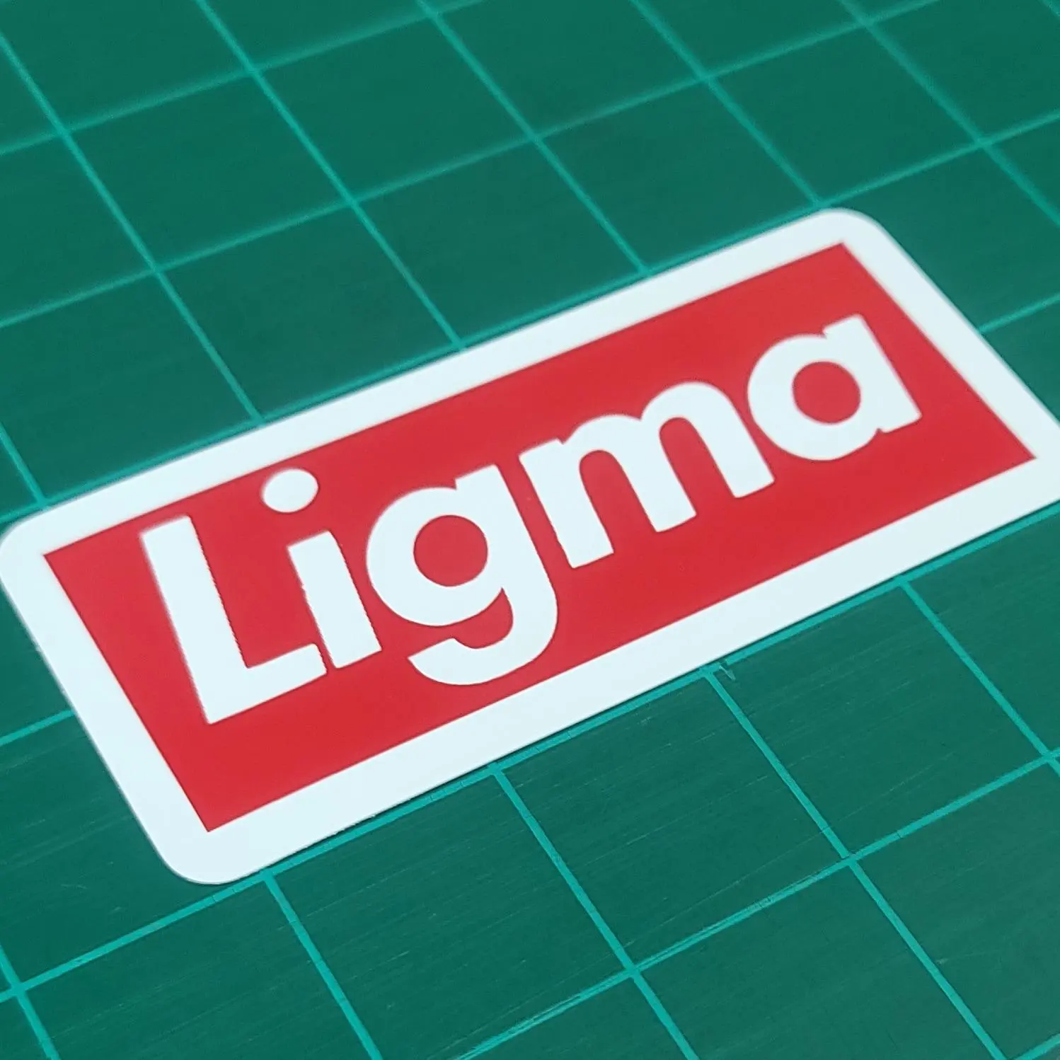 LIGMA Funny Decal Sticker - Premium Vinyl, Weatherproof, 2 inches Tall, 5 inches Wide, Vibrant Design, Easy to Apply and Remove, for Meme Culture Enthusiasts, Car Exterior Accessory, 2X5 In