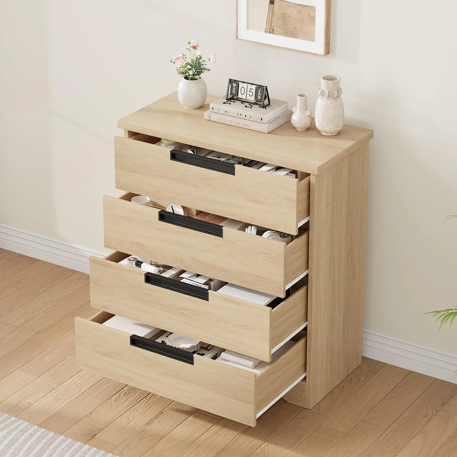 Chic dresser fitted with sleek embedded handles. 4 drawers offer tidy storage, ideal for multiple living spaces.