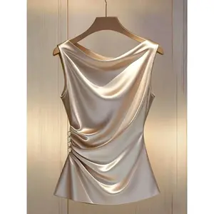 Elegant satin champagne halter top with pearl buttons, side ruching, slim fit—versatile fashion for daily wear and beyond