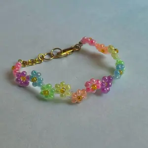 Pastel Rainbow Zigzag Flower Bracelet with Gold Accents - Colorful Beads and Vibrant Floral Design