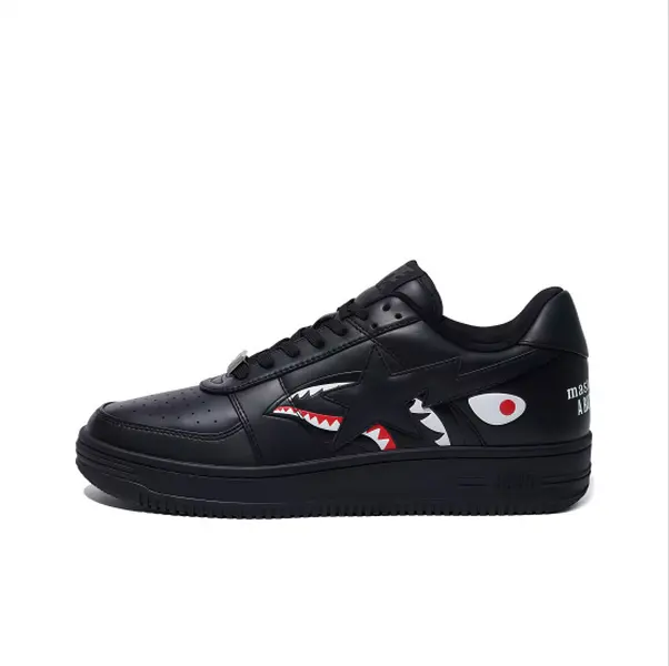 Sleek all-black low top sneakers with shark graphic and black star detail, smooth leather upper, unisex streetwear shoes for daily casual styling