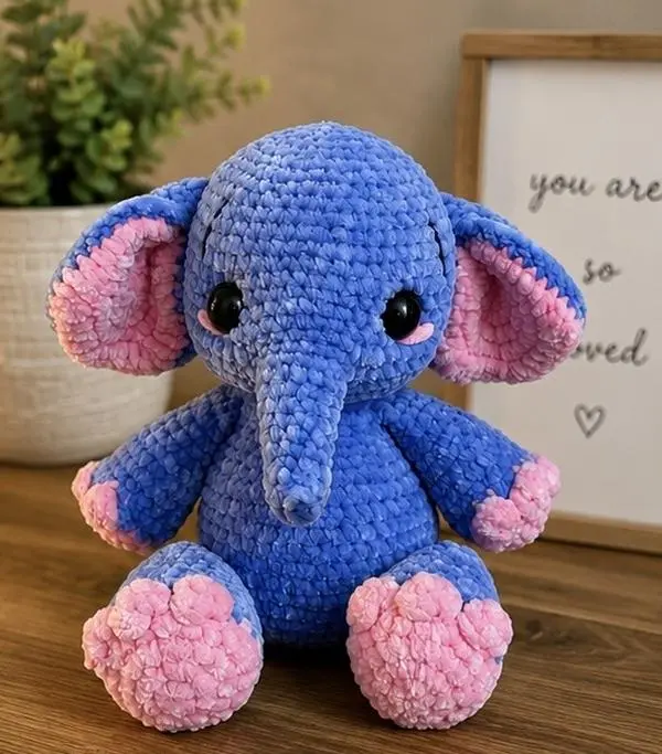 Crochet Bliss by V Handmade Blue Elephant Crochet Plush, Soft Stuffed Animal with Pink Ears, Pink Paw Pads & Floppy Ear Details, Gift & Room Decor