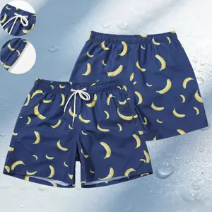 Men's multi colored banana print drawstring shorts with an adjustable waistband featuring allover banana prints, lightweight quick dry fabric, perfect for fun loving men's beach vacations or poolside casual fashion statement pieces