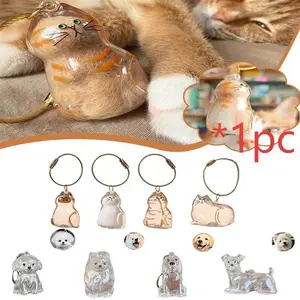 Transparent cute pet plush collection commemorative capsule - dog hair pendant keychain, novel and fashionable souvenir car decoration gift Keychain For Bags
